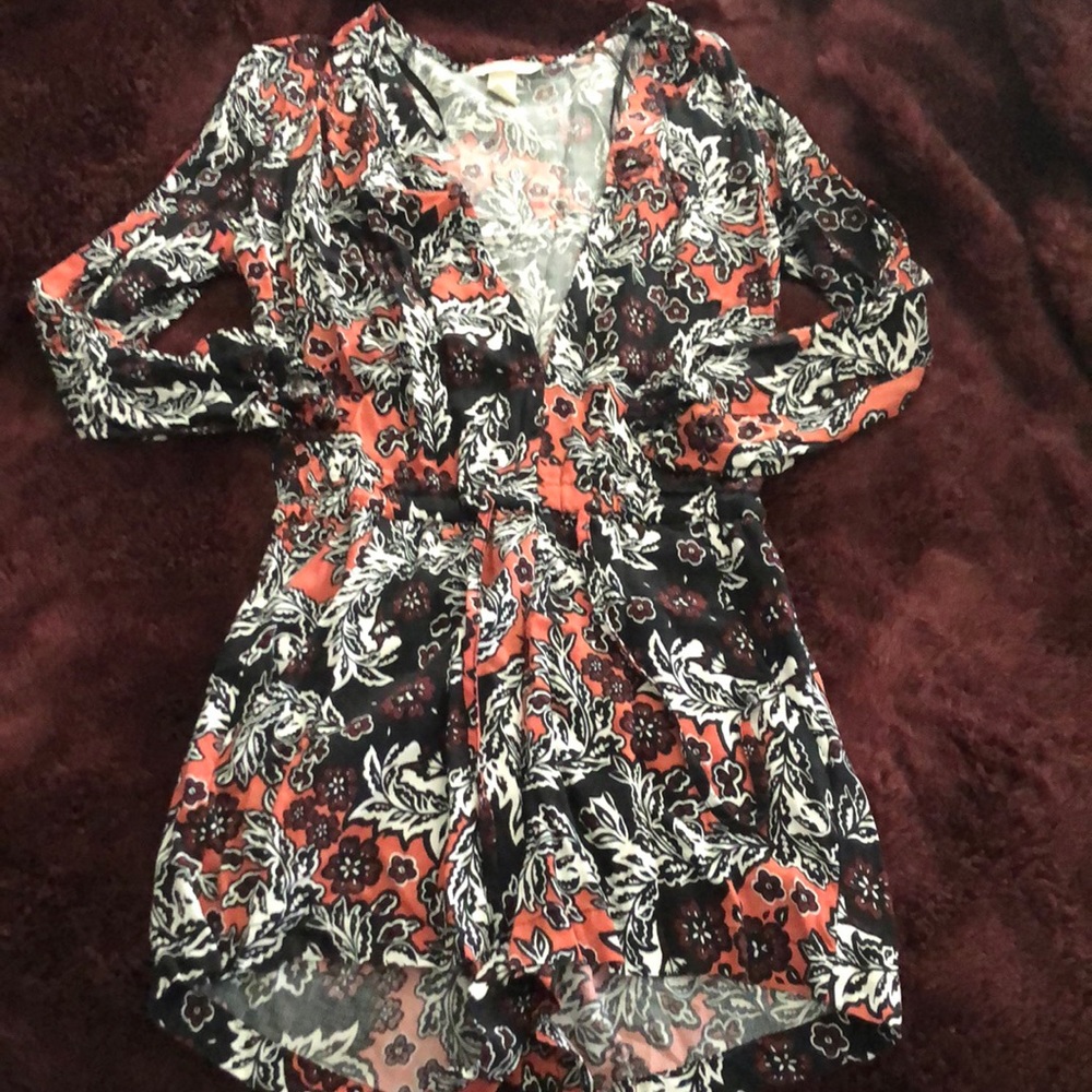 Deep neck long sleeved romper